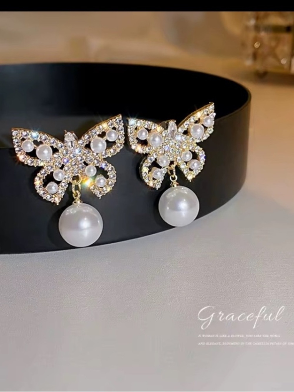 ** Graceful Gold Butterfly Drop Earrings with White Pearls